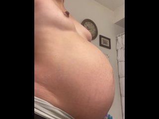 Pregnant Milf Rubs Belly and Then_Strips