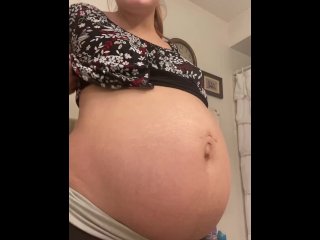 Pregnant Milf Rubs Belly and Then Strips