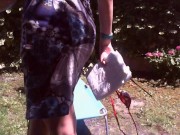 Preview 1 of Nicoletta sunbathes in a public garden wearing a big dirty diaper