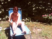 Preview 5 of Nicoletta sunbathes in a public garden wearing a big dirty diaper