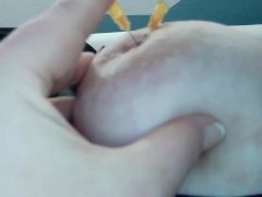 Slut comes while stitching needle in nipple