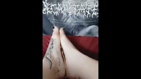 Giantess crushes tiny man between her tattooed feet