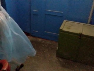 Naked walk in a raincoat at night