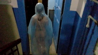 Naked walk in a raincoat at night