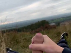 TEEN JERKING OFF IN PUBLIC FIELD