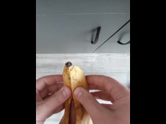 Guy solo fucks banana and cums on the floor
