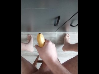 Guy solo fucks banana and cums on the floor