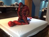 carnage has fun with spiderman dummy
