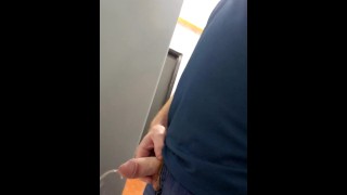 Ginger pissing in public restroom 