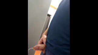 Ginger pissing in public restroom 