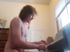 Playing piano naked