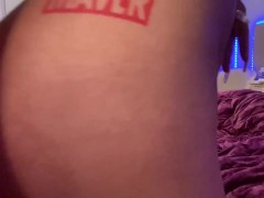 Naked bitch fucks herself in the ass with a glass dildo