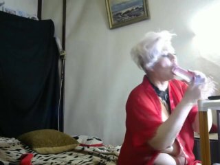 A beautiful mature bitch sucks different typesof cocks: from a dildo to a real strongdick!