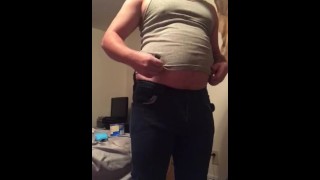 Belly bloating and inflating in tight clothes 