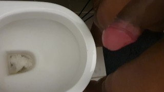 Pissing. Black dick urinal piss and wank