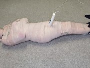 Preview 4 of Harley Quinn wrapped in layers of mummification bondage then teased with a wand & made to cum