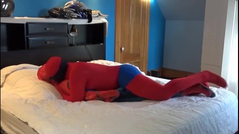 red zentai in blue sheathed cock cums on dummy spiderman