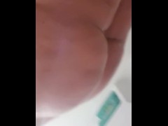 Big ass showering milf