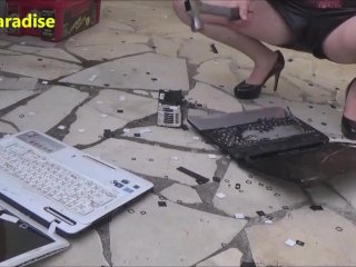 Sexy Woman Destroys 2 Laptops with Her High Heels and withA Hammer