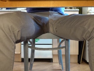 Pissing in Jeans under the Table