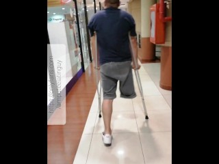 Amputee Guy Walking with Crutches