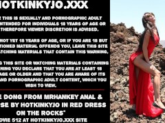 Large dong from mrHankey anal & prolapse by Hotkinkyjo in red dress on the rocks