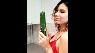 Slim beauty has fun with a HUGE Cucumber