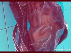 Brunette tight babe in the pool