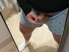 A very risky wank in the changing room!