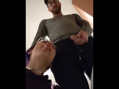 pixie with her fat tongue out waits next to Master while He's pissing then licks the dripping tip
