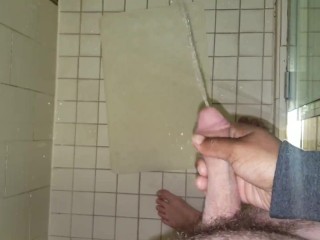 Penis Envy. Shooting his Piss all over in the Hotel Shower! Holding his Dick while he Pees.