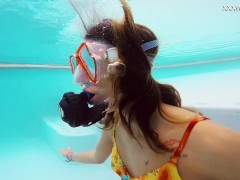 A perfect brunette babe Katya Nakolkina underwater