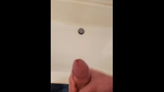 Shooting big load into bathtub