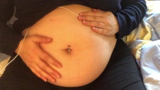 Girl With A Swollen Belly And A Loud Belly