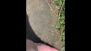 Feet playing in a puddle