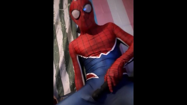 Spiderman masturbates with wand