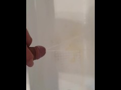 Hot man peeing in the tub with a boner double stream