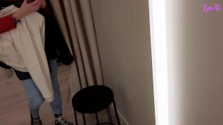 Public masturbation in dressing room and intense orgasm while listening to people on the other side