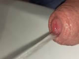 closeup foreskin while peeing