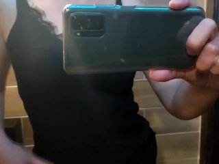 Alice walks down the street to a cafe and at_the entrance and exposes_body parts