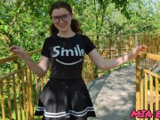Preview 4 of A beautiful girl with glasses walks and seduces people in the park with her look