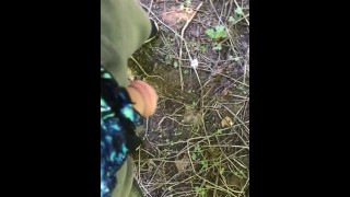 Pissing outdoors wearing a thong
