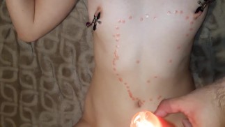 Face sitting - Sex slave moans from hot wax and nipple clamps