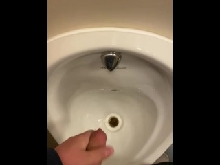 Wanking in Public Hotel Toilets with Big Cumshot