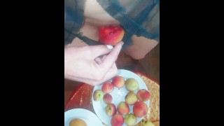 A Cute Girl Stuffs Fruits Into Her Underwear And Sticks Them In Her Pussy