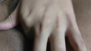 Spreading my pussy lips open and fingering myself