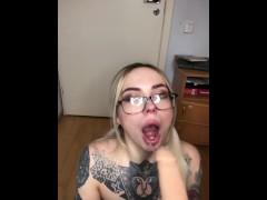 A blonde in a checkered skirt sucked a strap-on