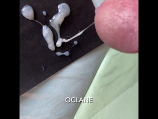 massive ejaculation onto a black paper