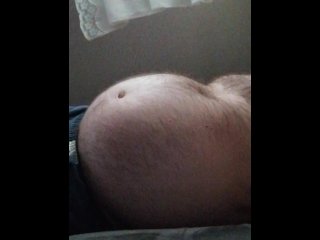 on my couch with contractions. it hurts