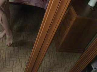 lesbian girl seduces at the mirror. Lesbian dance while her girlfriend is in the shower